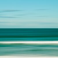 an artwork showing the ocean in teal