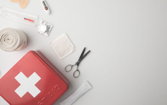 first aid kit spread over a table