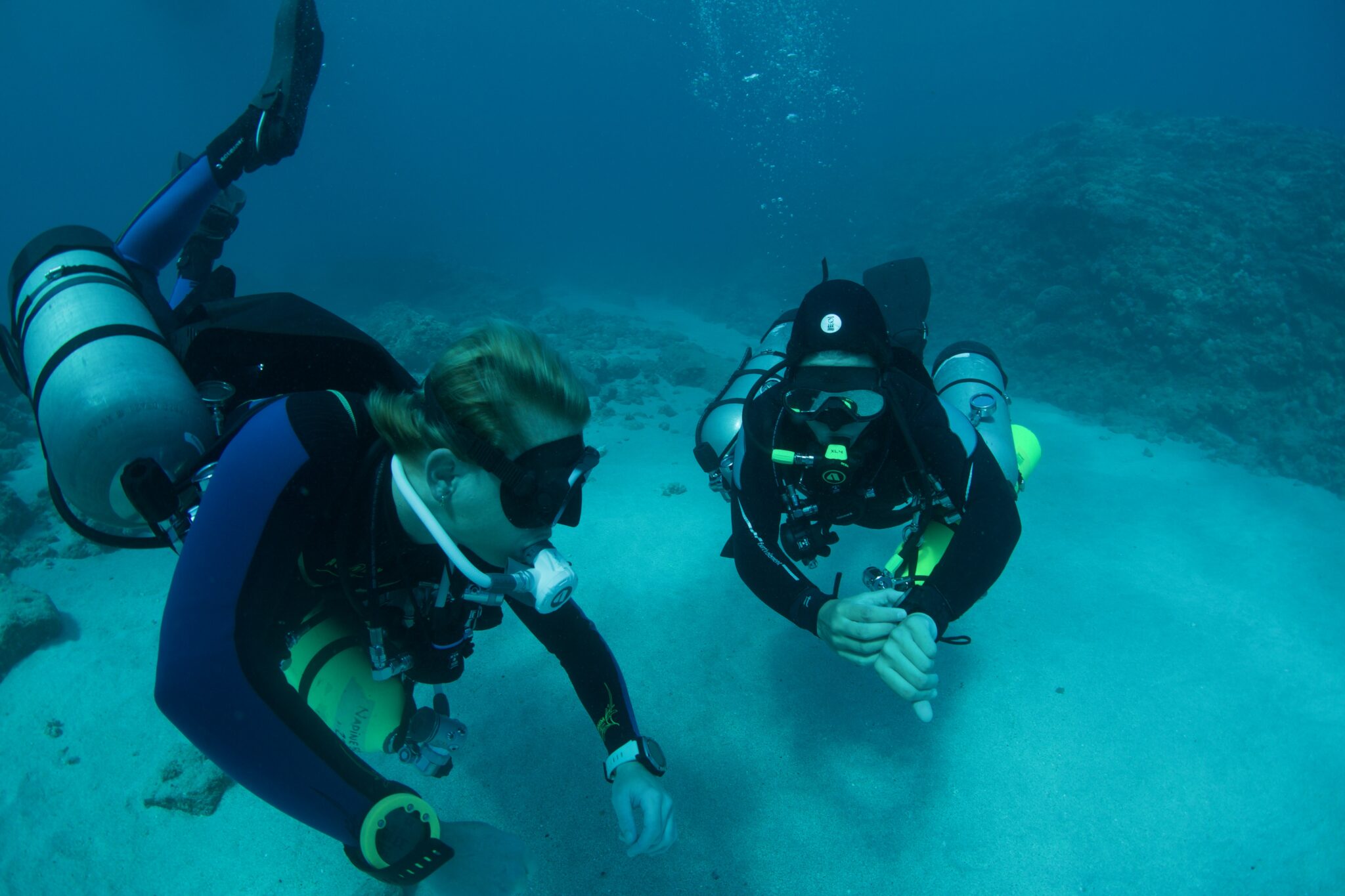 Emma Andrews and her buddy diving with sidemount configuration