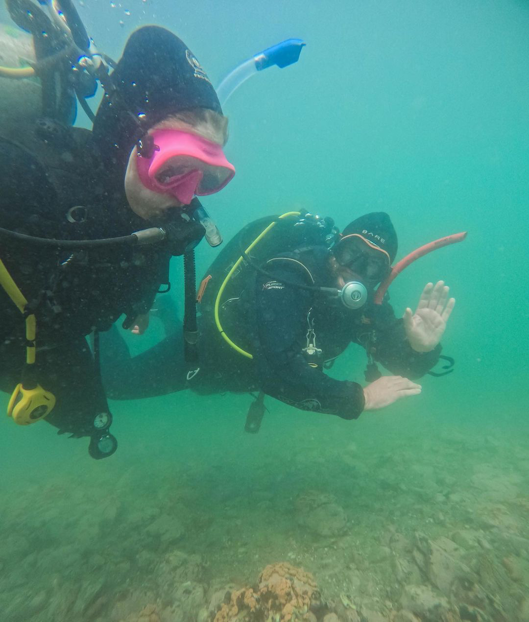 diver being lead underwater