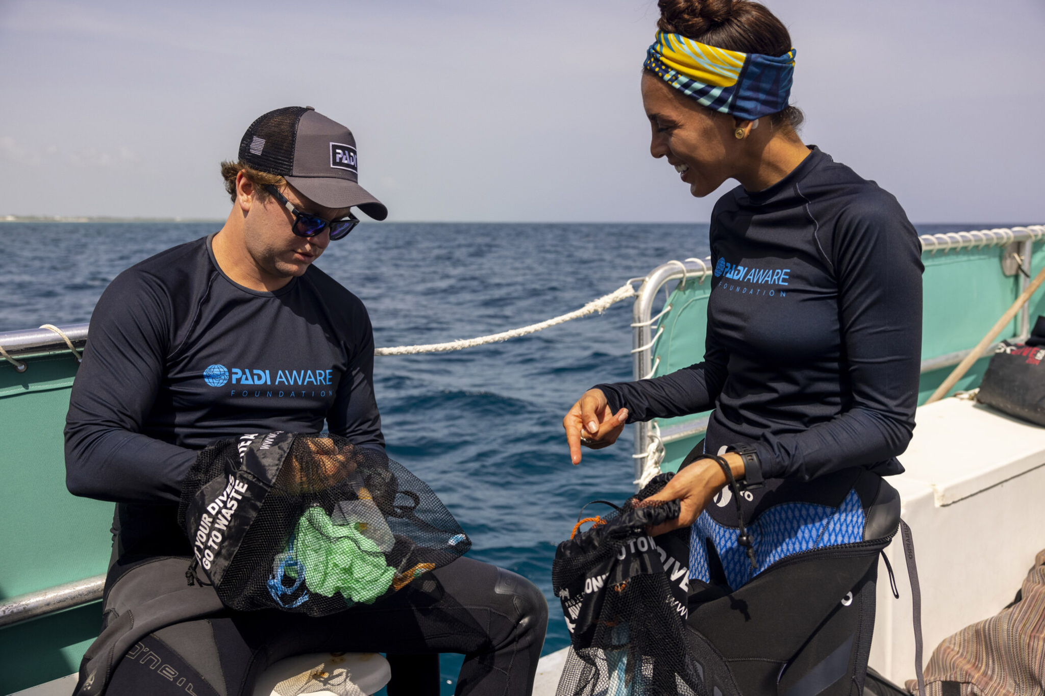 Divers completing their PADI AWARE Specialty, Dive Against Debris