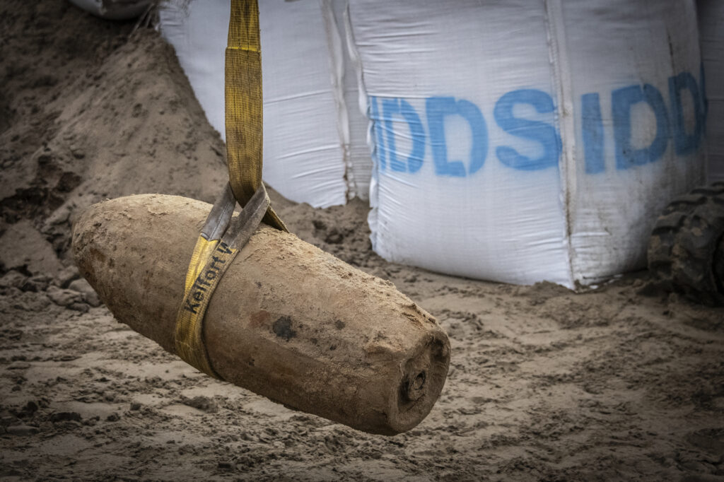 A bomb from WWII gets extracted by experts.