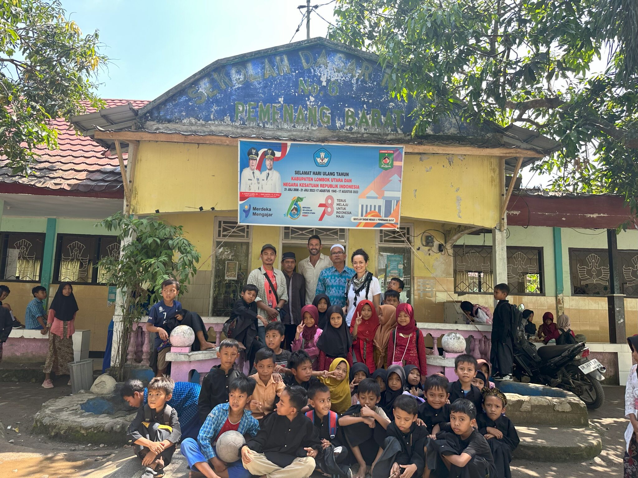 Captain Jason Chambers visiting a school with Classrooms Of Hope in Indonesia