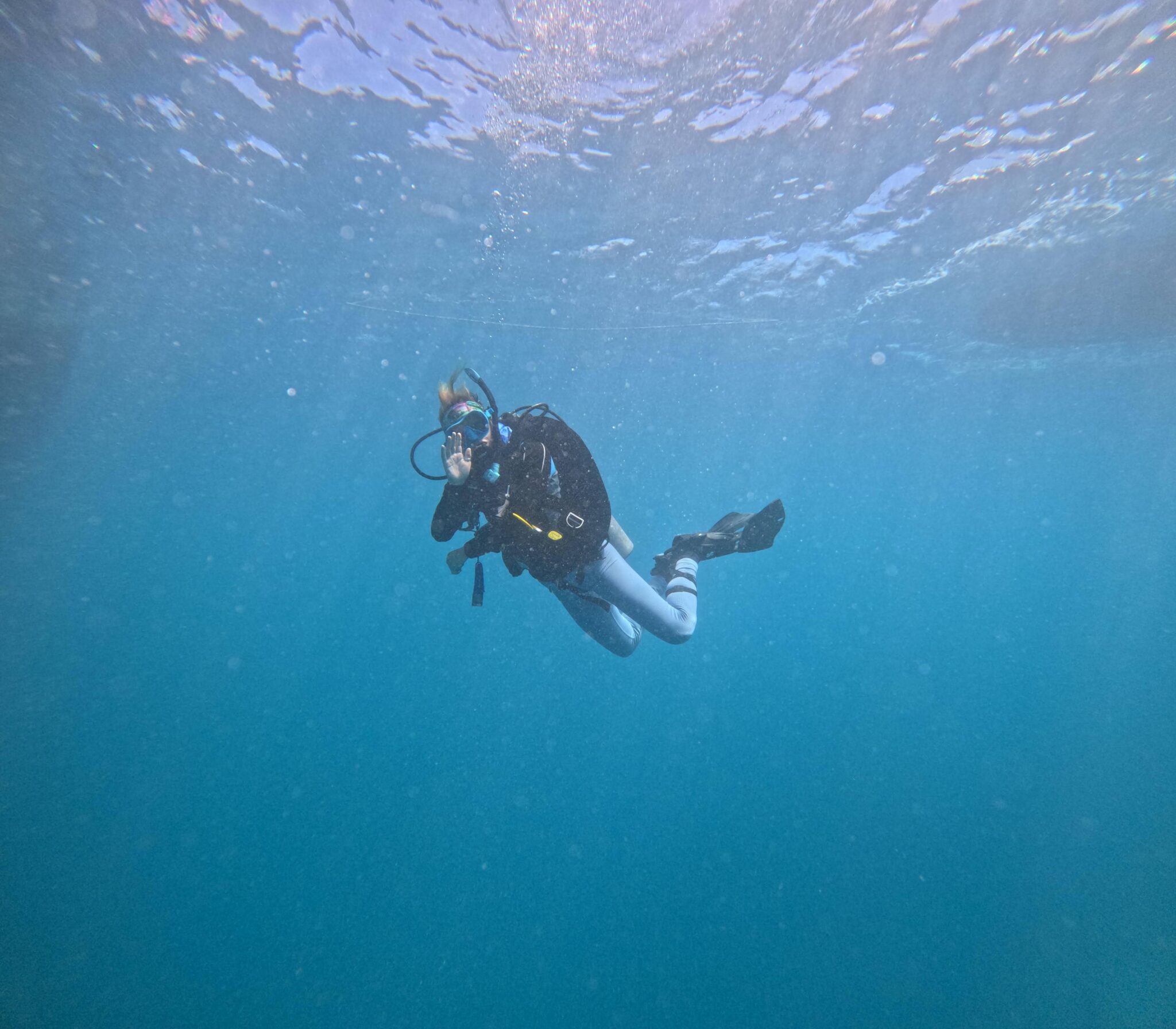 Skye floating in the sea during her Instructor Development Course in the Great Barrier Reef