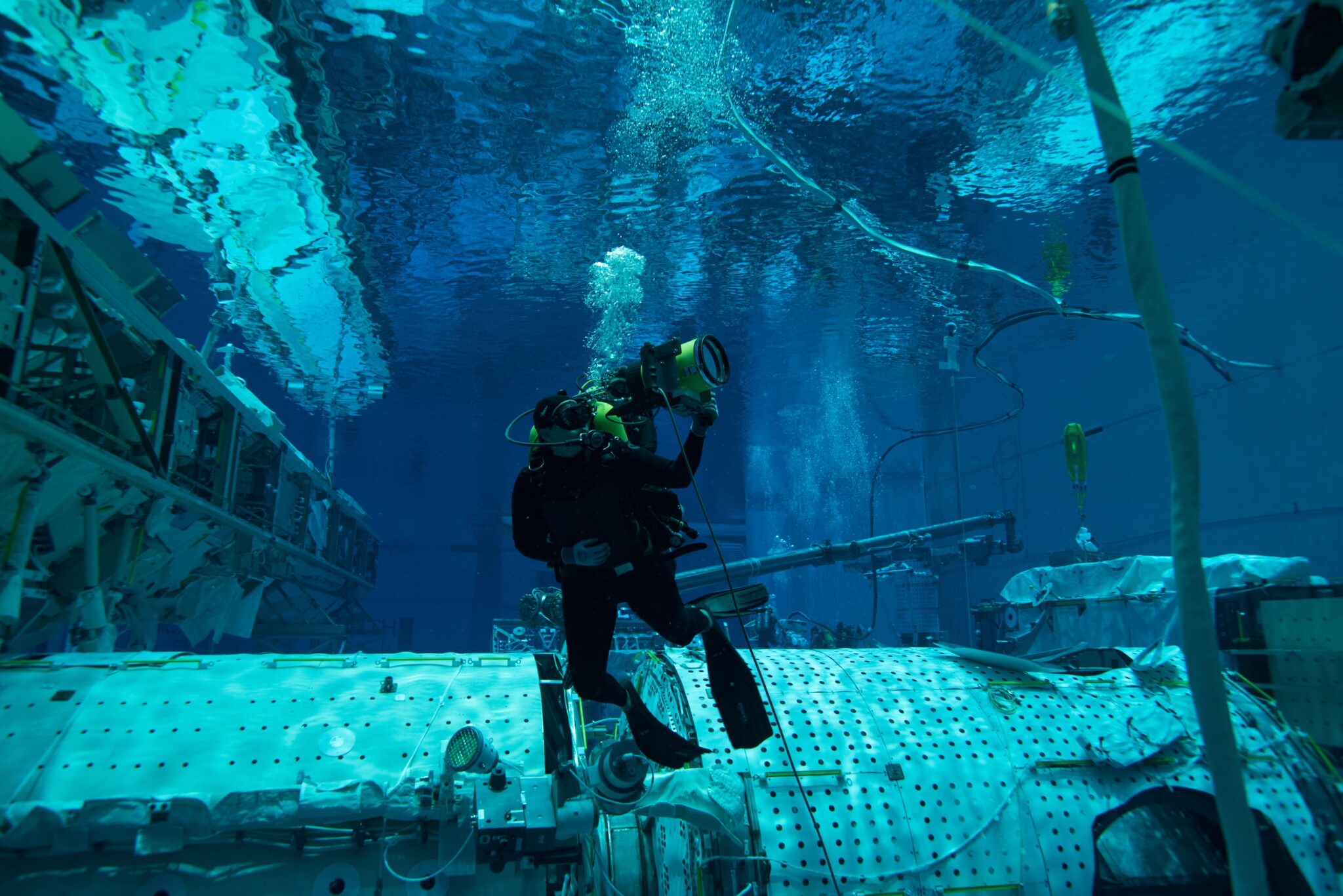 Arielle Valdez, Dive Operations Specialist and Test Director at NASA’s Neutral Buoyancy Lab in her office.