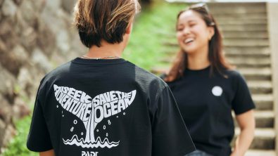 two models wearing a PADI fin design t shirt
