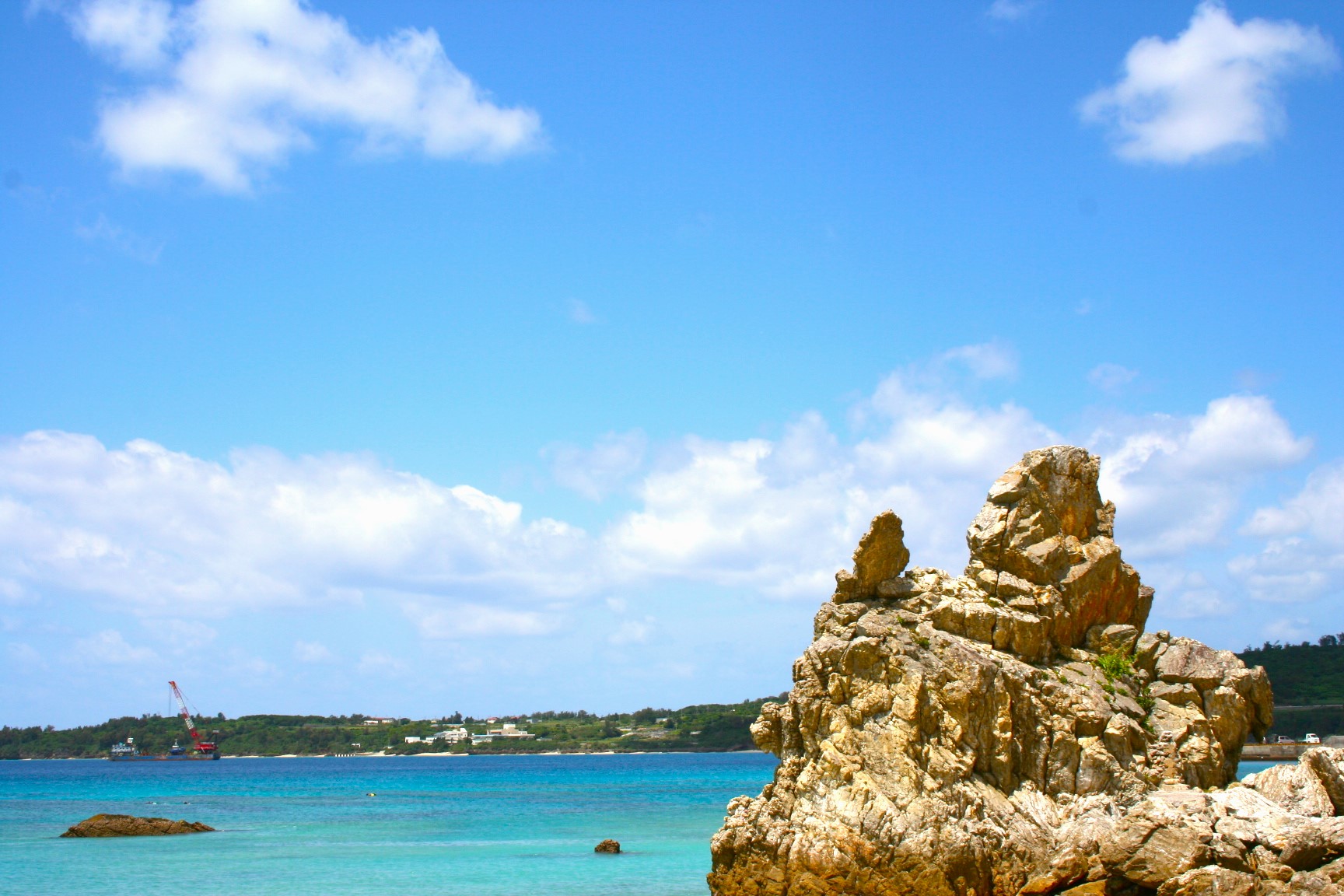 sakimotobu beach with gorilla look like rock in okinawa