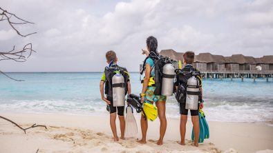 a mom and her two sons go scuba diving in the Maldives