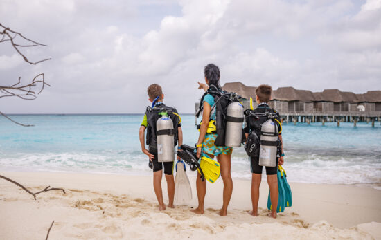 a mom and her two sons go scuba diving in the Maldives