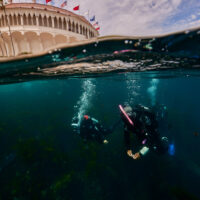 two divers explore casino point in California