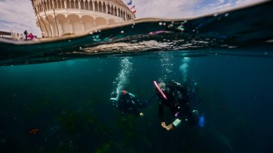 two divers explore casino point in California