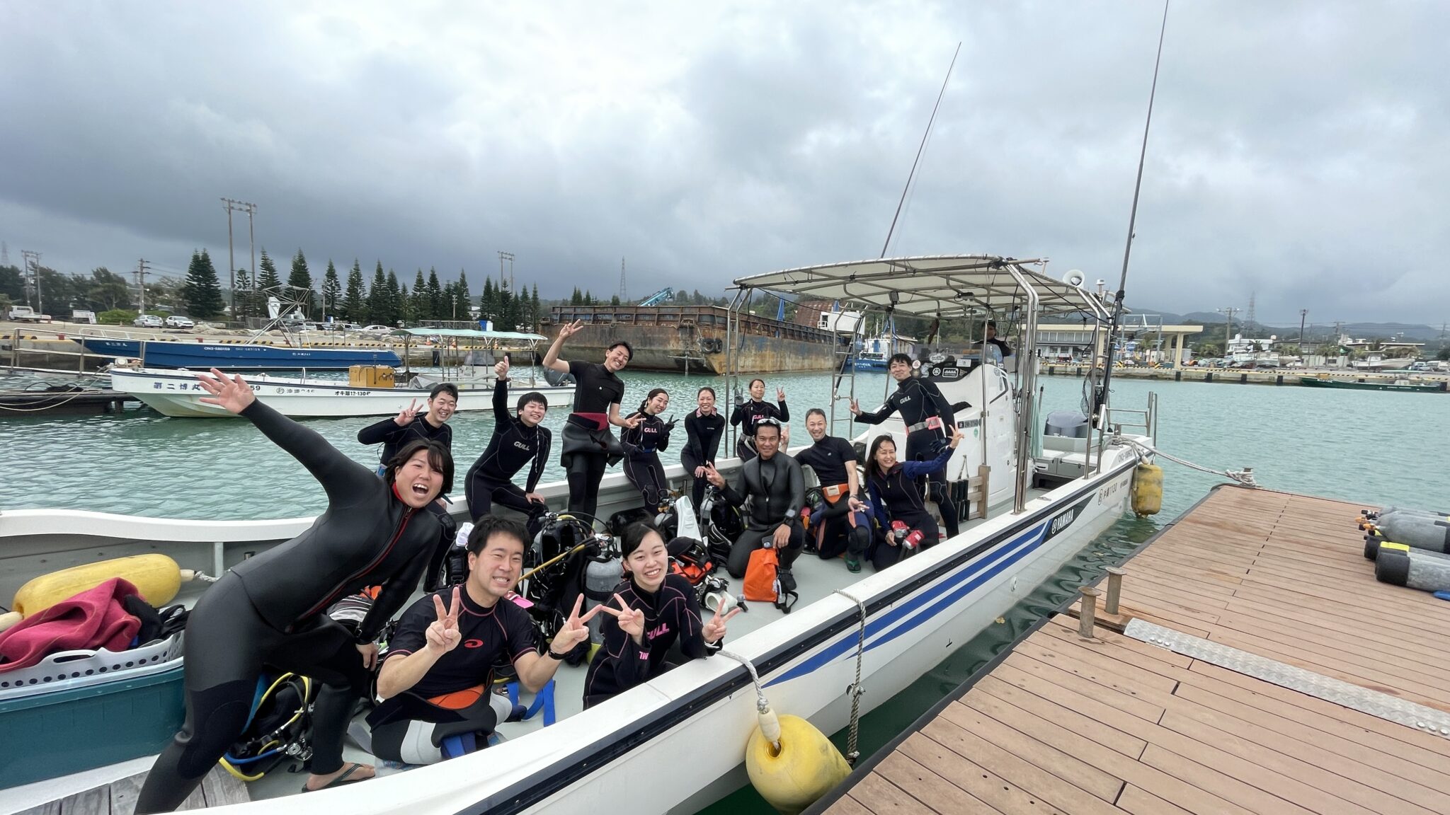 divers on the boat departing for coral conservation activity