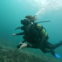 Divemaster intern Sidney underwater