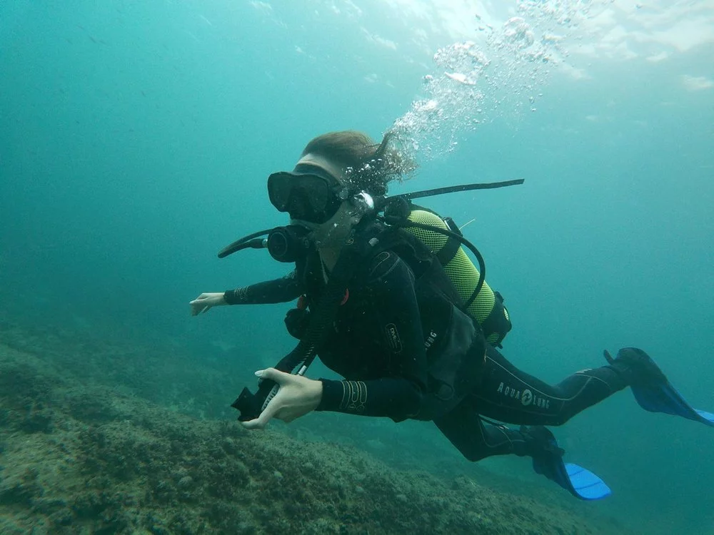 Divemaster intern Sidney underwater