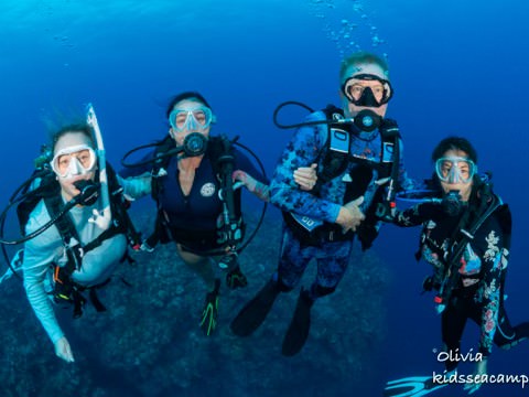 Margo Peyton, PADI CEO Drew Richardson and Kristin Valette-Wirth, Chief Brand and Membership Officer