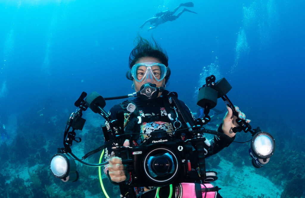 Margo Peyton with her underwater camera on a dive