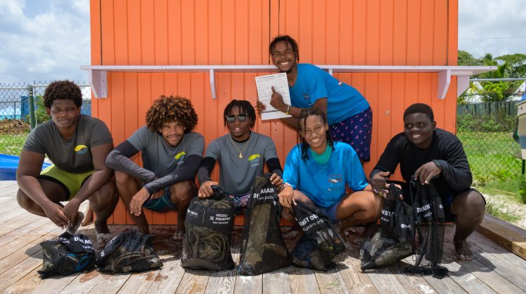 Six teenage children in Barbados complete a PADI AWARE Dive Against Debris after taking part in the Water Awareness Program