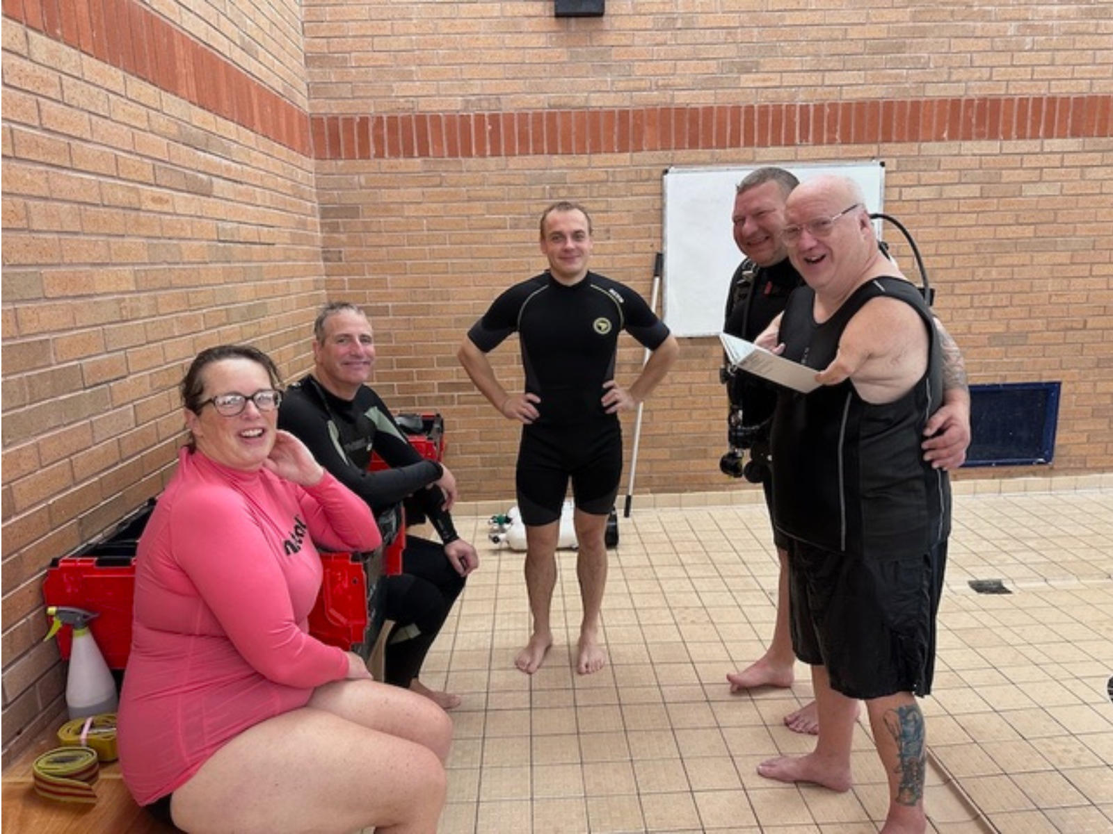 Nic Carapanagiotu teaches his scuba diving students