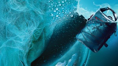 GROUNDTRUTH X PADI Waterproof Backpack pictured next to a fishing net