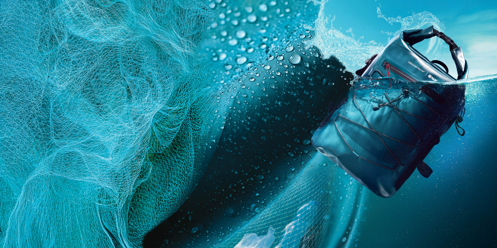 GROUNDTRUTH X PADI Waterproof Backpack pictured next to a fishing net