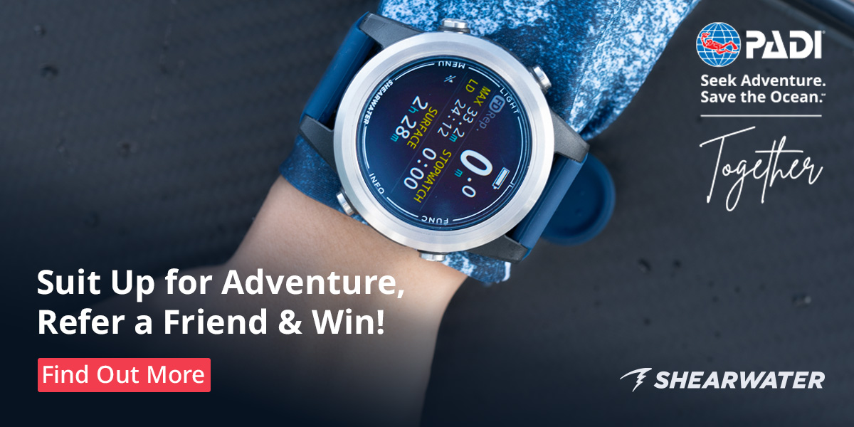 Shearwater Refer a Friend Challenge banner showing a dive computer on a diver's wrist