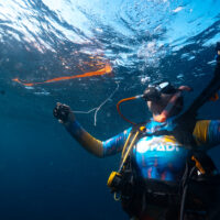 a PADI Diver nears the surface after a scuba dive
