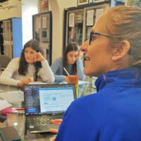 PADI Ocean Torchbearer Tatiana Geloso teaching a classroom of students about conservation