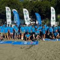 Group of divers on the beach for the D