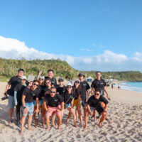 Carrie Tsai - Ocean Torchbearer Award Winner - team photo on the beach