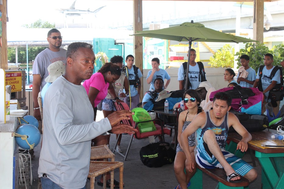 Les Burke- Ocean Torchbearer Award Winner - talking to a group of kids
