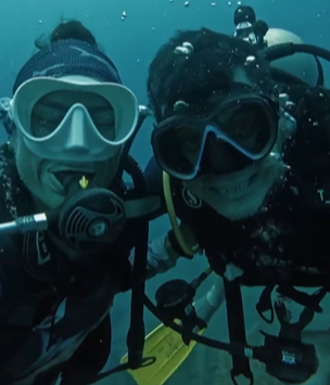 karol yela scuba diving with her brother