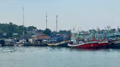 Photo of Samaesan Pier in Thailand with several large fishing boats