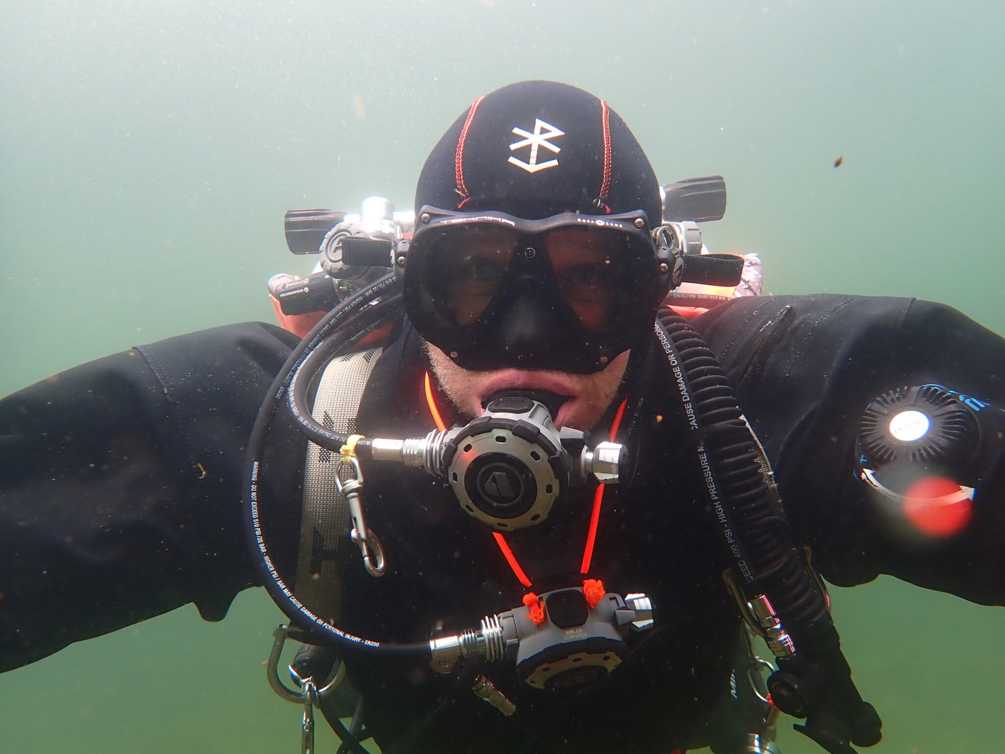 michel blouin facing the camera diving
