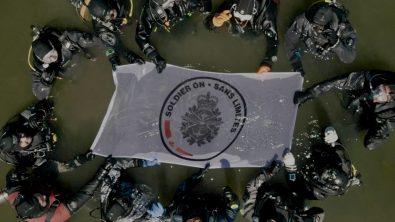 course participants from above with flag