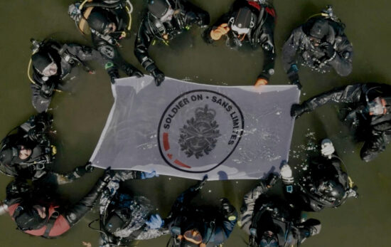 course participants from above with flag