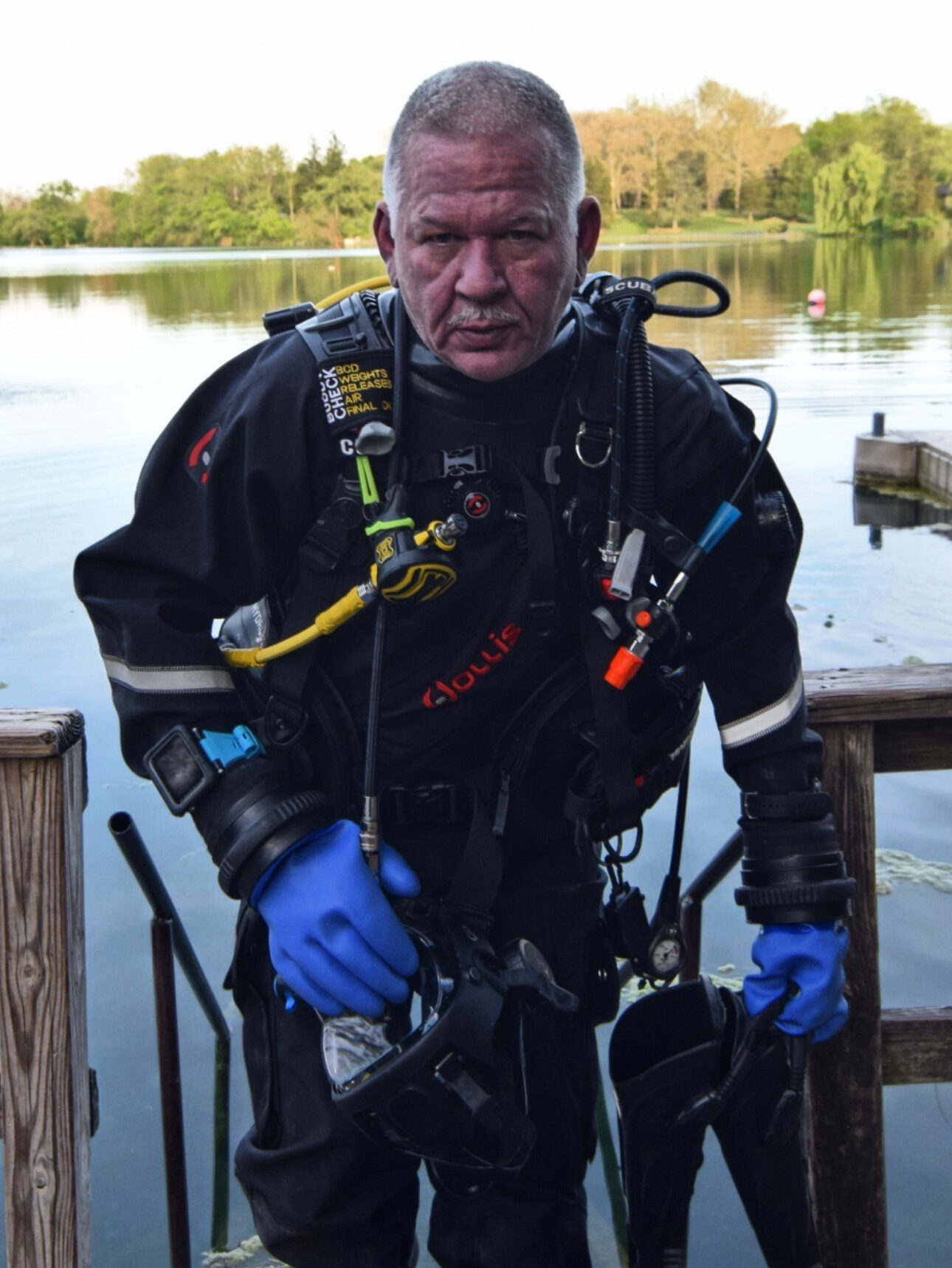 Curt Tomlinson exits the water wearing a dry suit