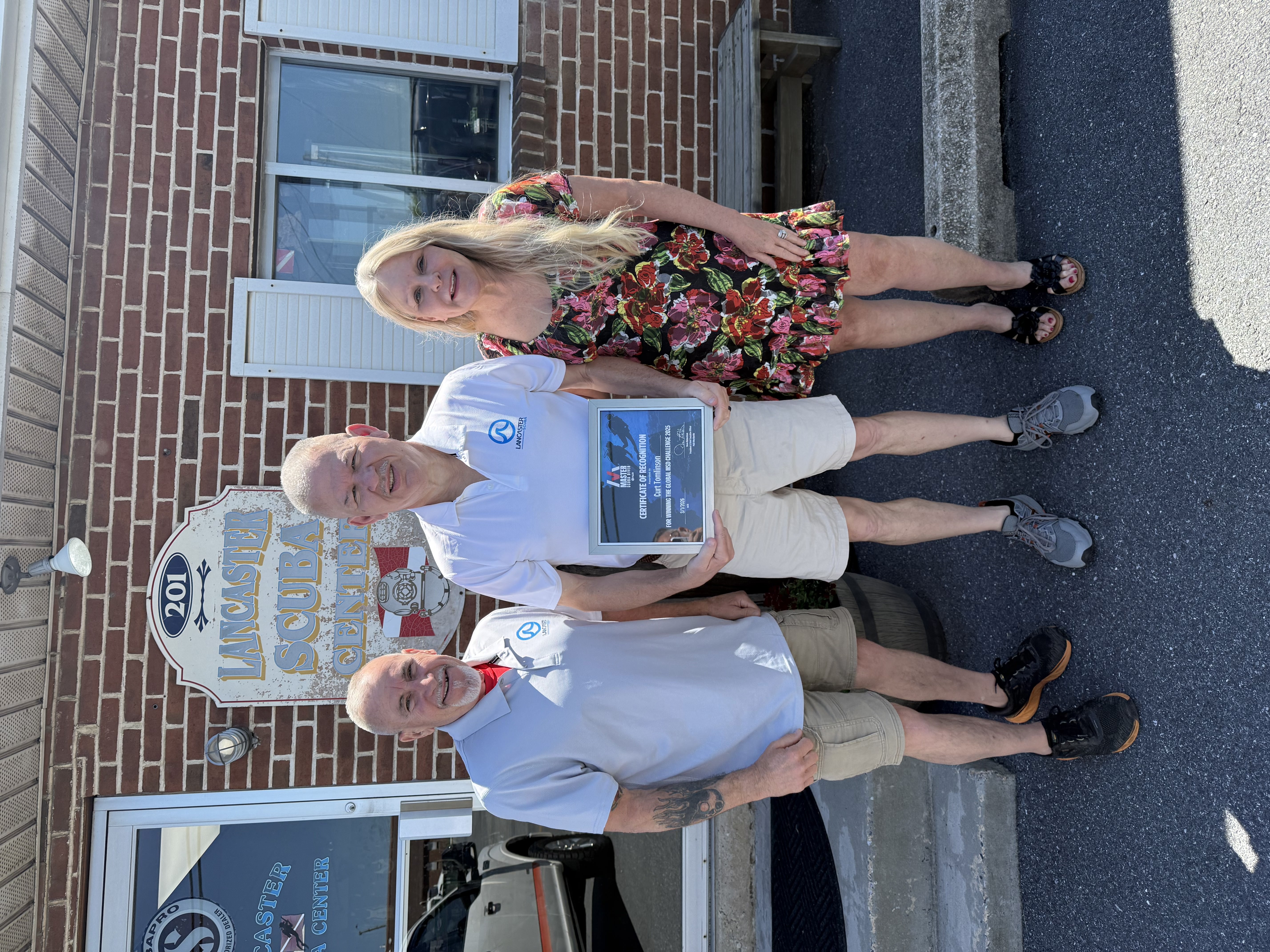 Curt and team in front of a dive center in Pennsylvania