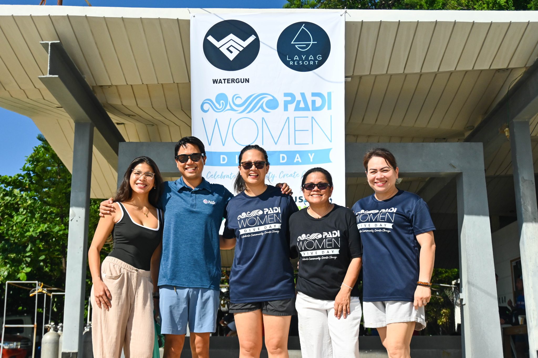 5 divers posing on the surface before a WDD cleanup in Batangas, Philippines