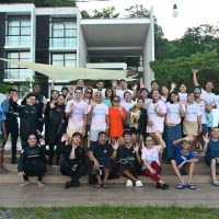 Divers gathering for a group photo on the surface before a WDD cleanup in Batangas, Philippines