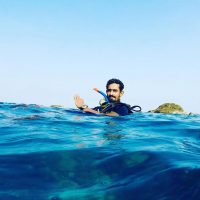 Sashaan Fernando floating on the surface after a dive in Sri Lanka
