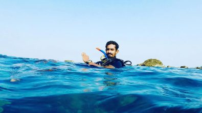 Sashaan Fernando floating on the surface after a dive in Sri Lanka