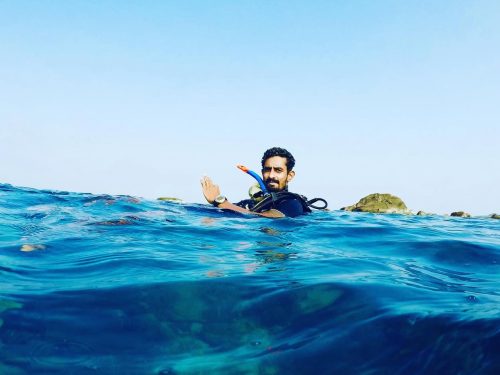 Sashaan Fernando floating on the surface after a dive in Sri Lanka