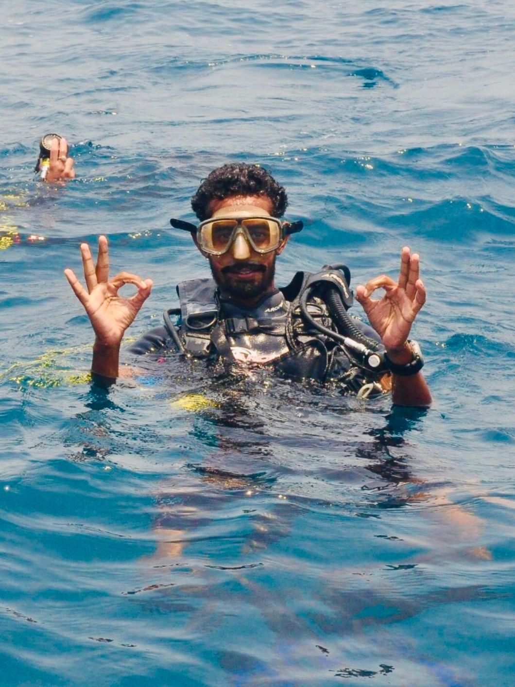 Sashaan Fernando floating on the surface after a dive in Sri Lanka